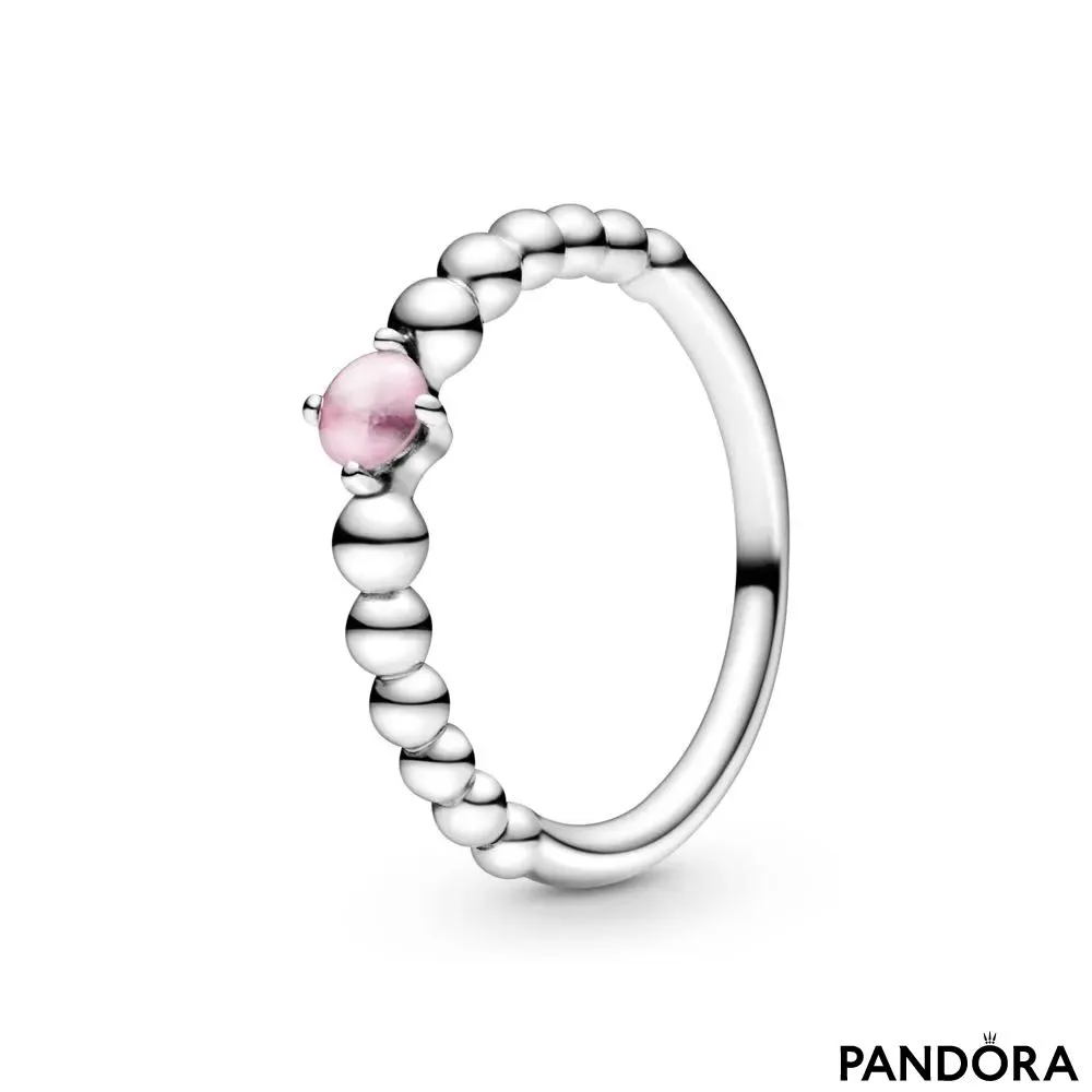 Кольцо из бусинок с пудрово-розовым камнем 