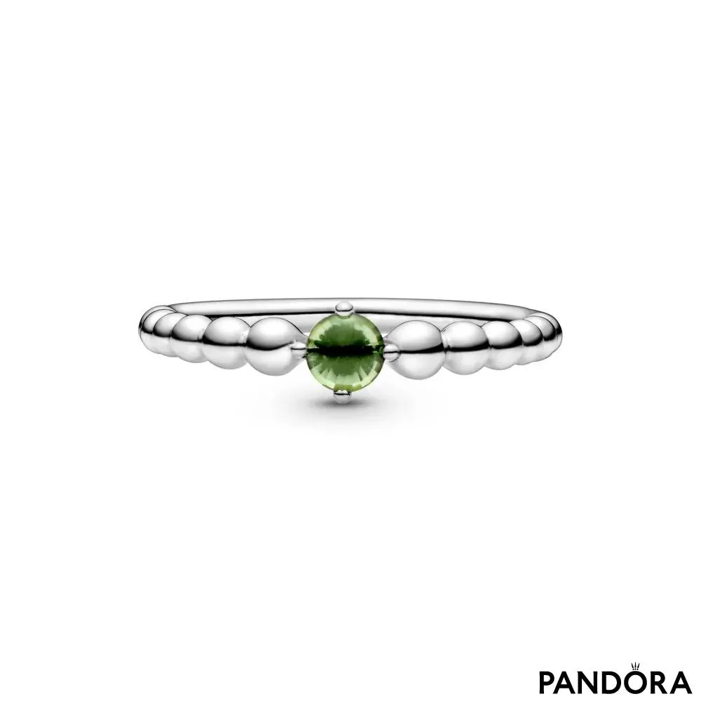 Кольцо из бусинок со светло-зеленым камнем 
