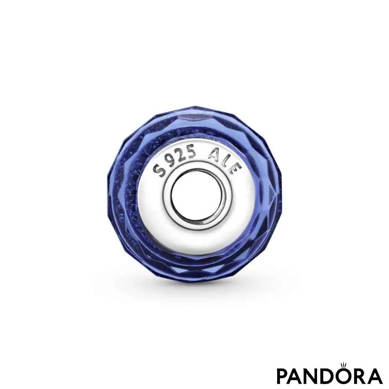 Abstract silver charm with faceted iridescent blue Murano glass
