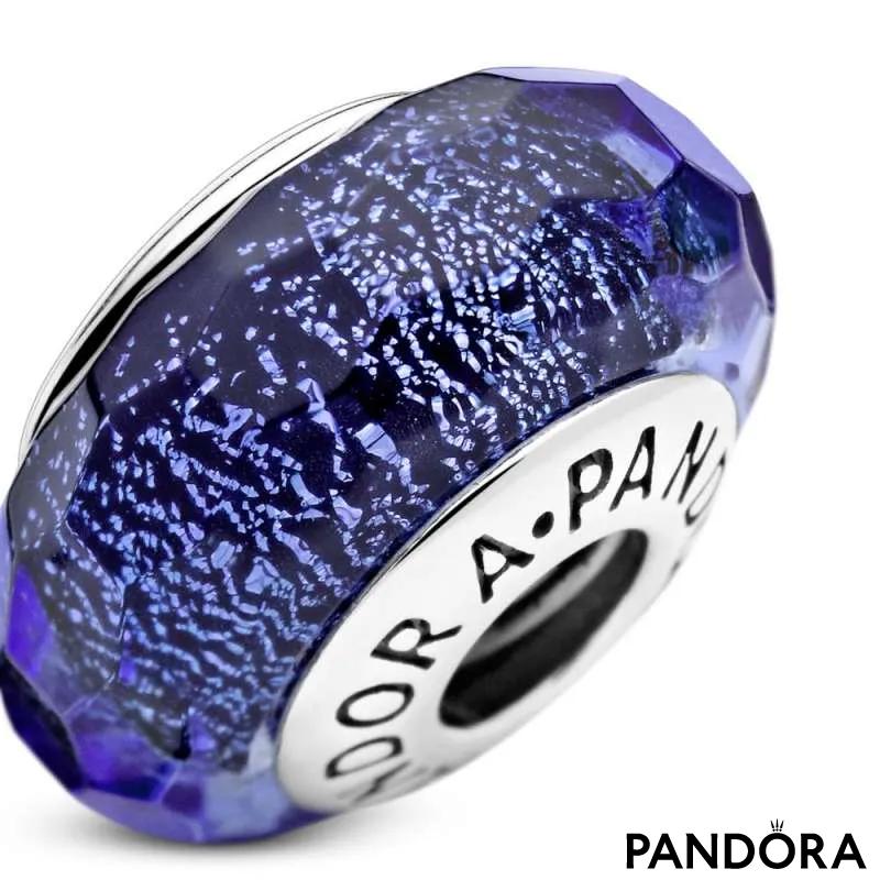 Abstract silver charm with faceted iridescent blue Murano glass
